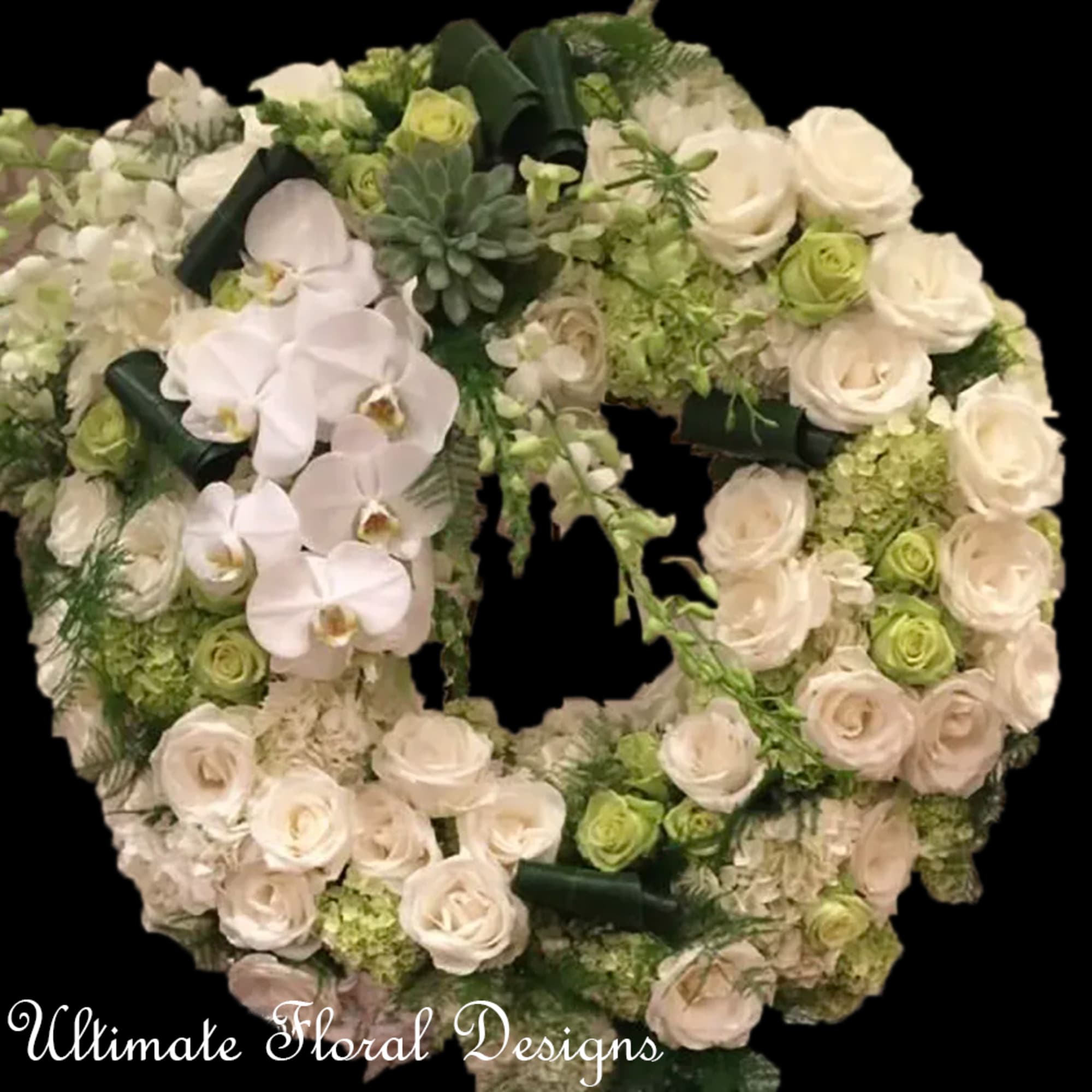 Heart-shaped floral wreath with white roses and orchids