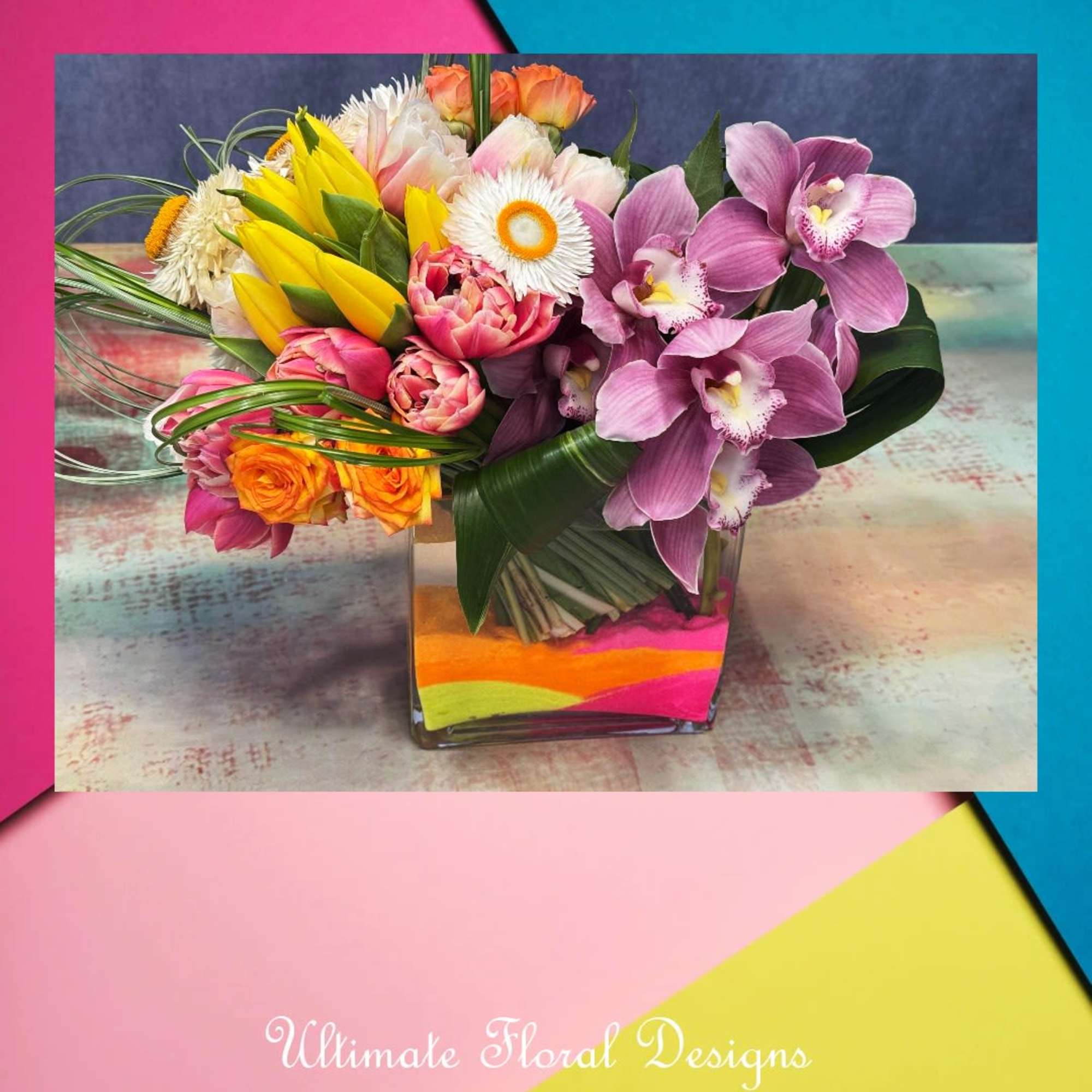 Mixed bouquet with purple orchids in a square glass vase