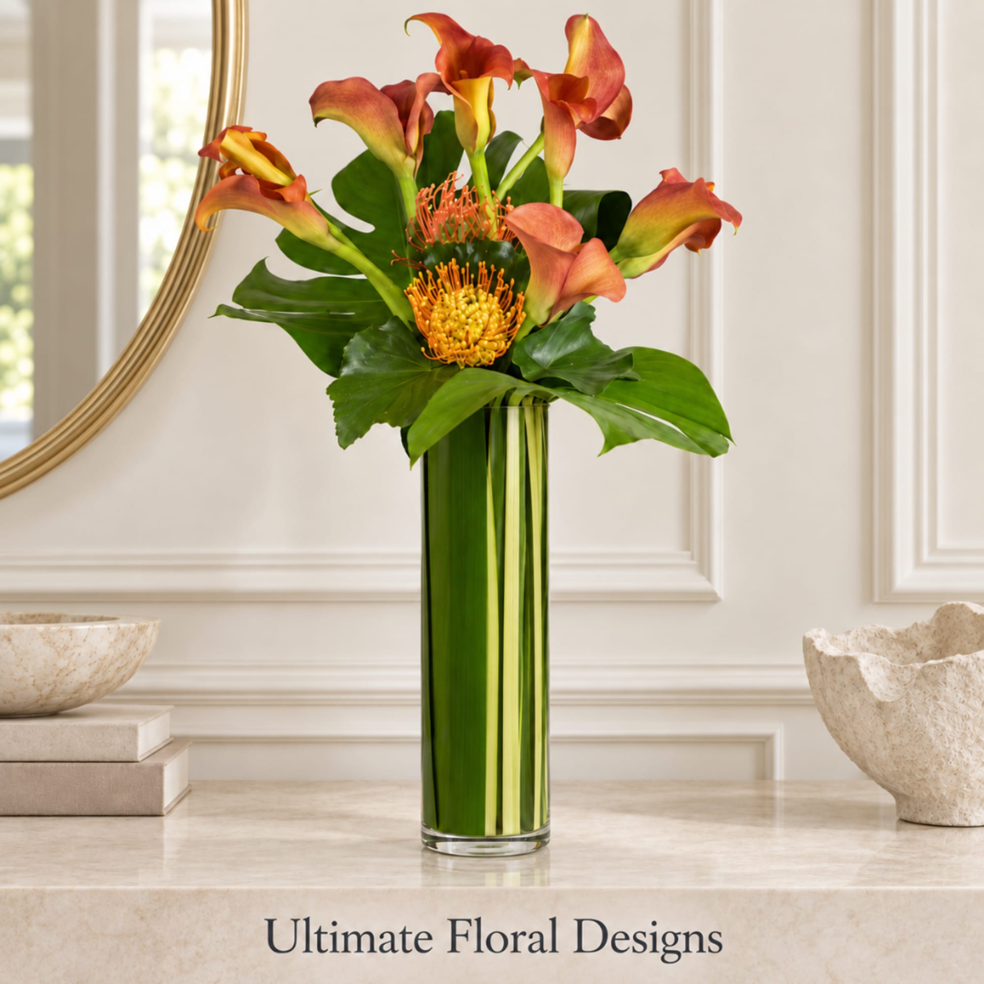 Orange calla lilies and pincushion blooms in a tall green vase