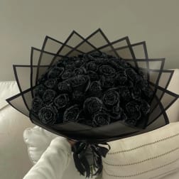 Black rose bouquet wrapped in geometric black paper