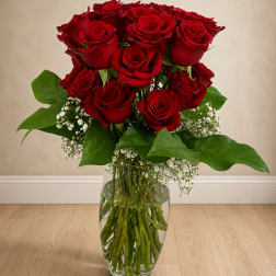 Bouquet of red roses in a clear glass vase