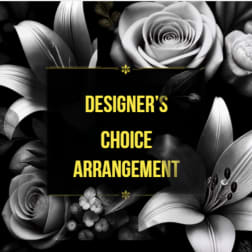 Black floral design with white roses and lilies around the words "Designer’s Choice Arrangement"