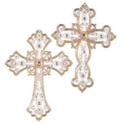 Two ornate gold and white decorative crosses on a white background