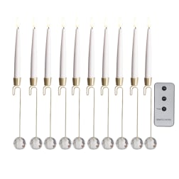Set of white taper candles with crystal drops and a remote control