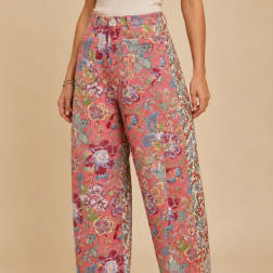 Person wearing floral-print wide-leg pants