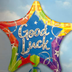 Colorful star-shaped balloon with the words Good Luck