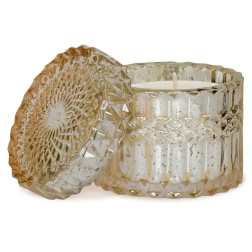 Two textured glass candle holders with white candles inside