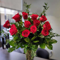Premium dozen red roses in the vase
