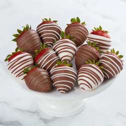 Chocolate-covered strawberries on a white pedestal stand