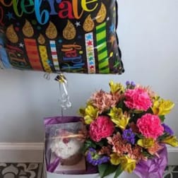 Birthday balloon with a flower bouquet and teddy bear gift box