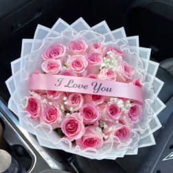 Pink rose bouquet with a pink "I Love You" ribbon
