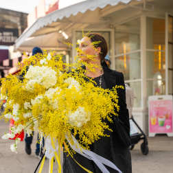 Large yellow and white bouquet with trailing ribbons