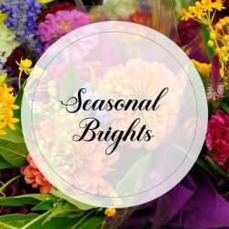 Seasonal Brights text over a colorful flower bouquet