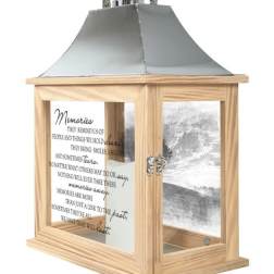 Wooden memorial lantern with a metal top and glass panels