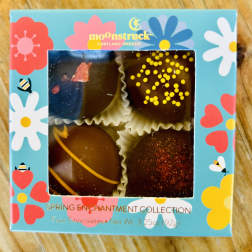 Box of four decorated chocolates in a floral spring-themed package