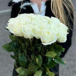 Bouquet of white roses with green foliage