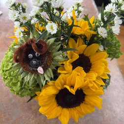 Sunflower bouquet with white daisies and a dog face decoration