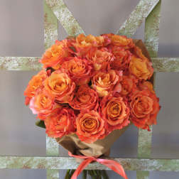 25 roses wrapped in paper