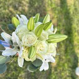 White rose and lily bouquet with green lily buds
