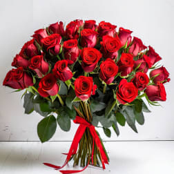 Bouquet of red roses tied with a red ribbon