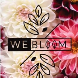 Close-up of white and pink dahlia-like flowers with a Webloom logo overlay