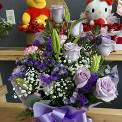 Roses and Lilly arrangement