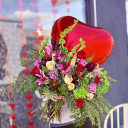 Bouquet of mixed roses and lilies with a red heart balloon