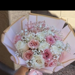 Pink and white rose bouquet with a Happy Birthday topper