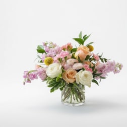 Mixed pastel bouquet in a clear glass vase
