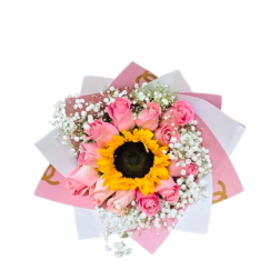 Round bouquet with a central yellow sunflower surrounded by pink roses and white filler flowers in pink and white wrap