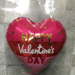 Heart-shaped pink balloon with "Happy Valentine's Day" text