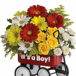 Bouquet of red, yellow, and white flowers in a red wagon with "It's a Boy!" text