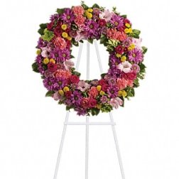 Colorful floral wreath on a standing easel