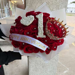 Red rose bouquet with a white "1" and heart decoration