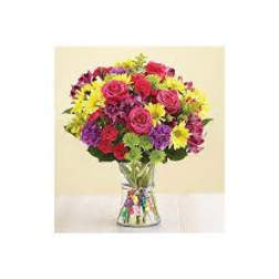 Colorful mixed bouquet in a clear glass vase