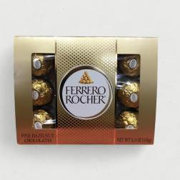 Box of Ferrero Rocher hazelnut chocolates in gold wrappers