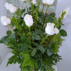 Long Stem White Roses arranged in a vase