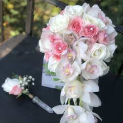 Pink and white bouquet with orchids and roses