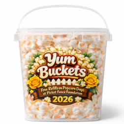 Clear plastic bucket filled with popcorn and a printed label