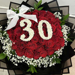 Red rose bouquet with white floral "30" and a white bow