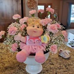 Pink Carnations, baby breath with a soft adorable baby girl or boy