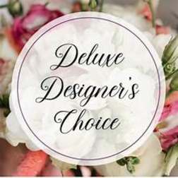 Circular label reading "Deluxe Designer's Choice" over a blurred floral background