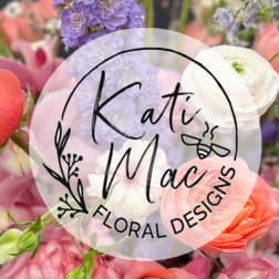 Pastel pink, peach, lavender, and white flowers with a circular Kati Mac Floral Designs logo overlay.