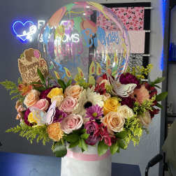 Mixed bouquet in a white hatbox with a birthday balloon