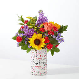 Colorful mixed bouquet in a birthday vase