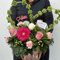 Pink and white mixed bouquet in a gift box with a heart-shaped green accent