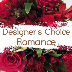 Red roses and mixed flowers around the words "Designer’s Choice Romance"