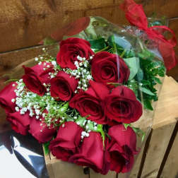 Bouquet of red roses with baby's breath in clear wrap