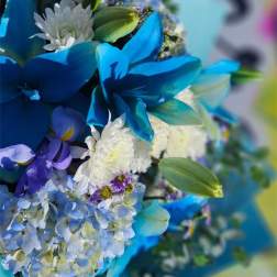 Blue and white bouquet with daisies and hydrangeas