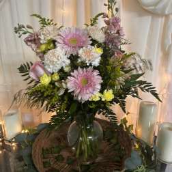 Pink and white mixed bouquet in a glass vase